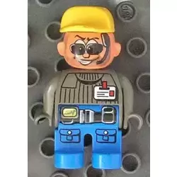 Duplo Figure, Male Action Wheeler, Blue Legs, Dark Gray Top with ID Badge with Belt, Yellow Cap, Sunglasses (4141907)