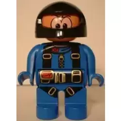 Duplo Figure, Male Action Wheeler, Blue Racing Suit with Harness Straps, Black Racing Helmet (4141891)