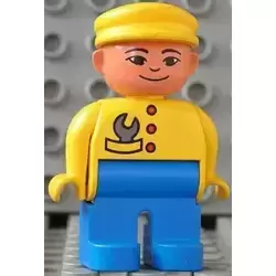 Duplo Figure, Male, Blue Legs, Yellow Top with Wrench in Pocket and Red Buttons, Yellow Cap, Grin