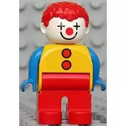 Duplo Figure, Male Clown, Red Legs, Yellow Top with 2 Buttons, Blue Arms, Red Hair Curly (4129940)