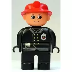 Duplo Figure, Male Fireman, Black Legs, Black Top with Flame Logo, Red Fire Helmet, no Moustache