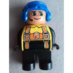 Duplo Figure, Male Fireman, Black Legs, Yellow Top with Flame and Orange Suspenders, Blue Aviator Helmet