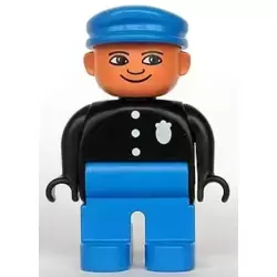 Duplo Figure, Police Officer - Male, Adult Man, Blue Legs, Black Top with Buttons and Badge Pattern, Blue Hat, Nougat Head with Turned Down Nose